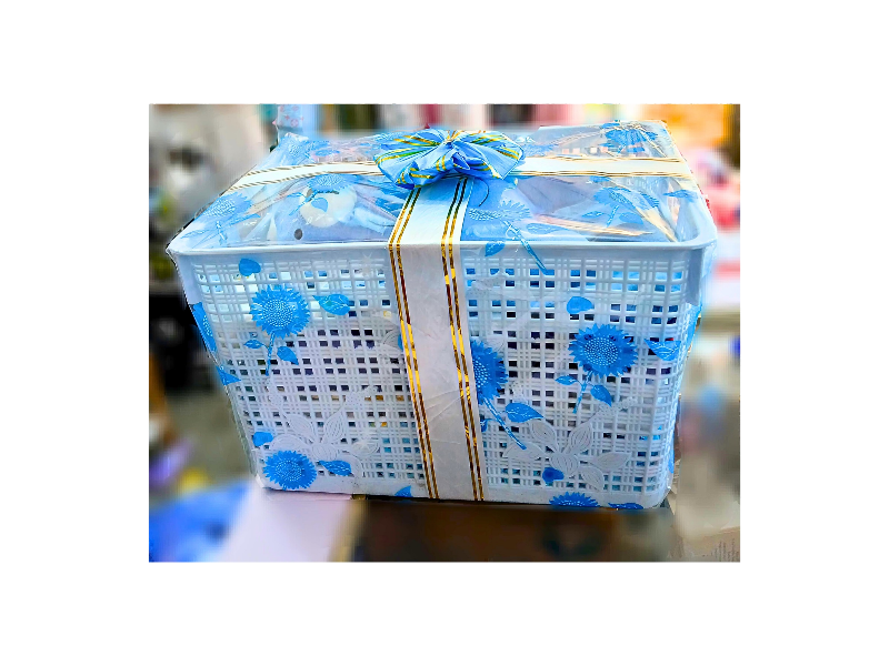 baby and mom gift hamper packaged with blue bow